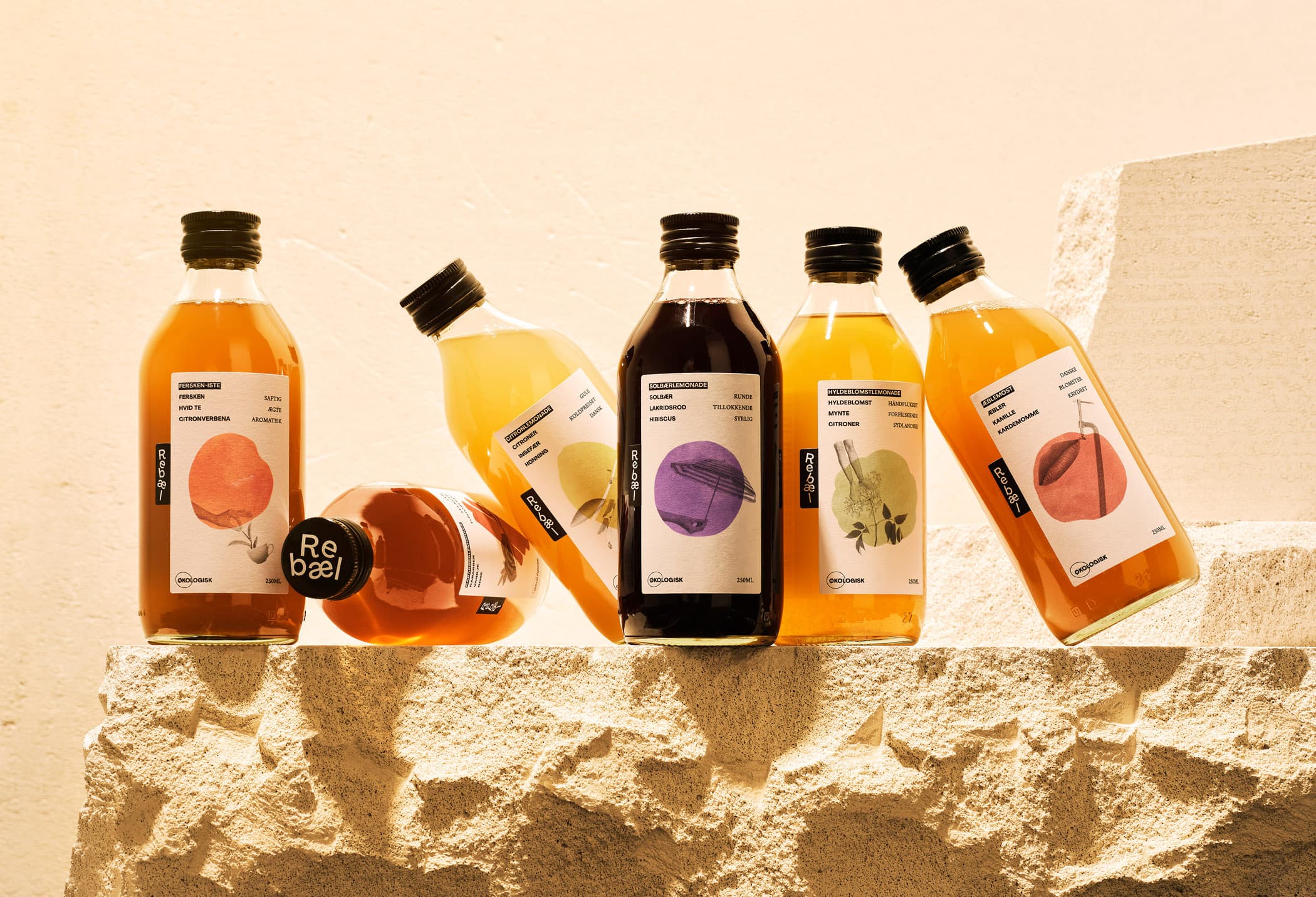 The full range of Rebel juices standing next to each other