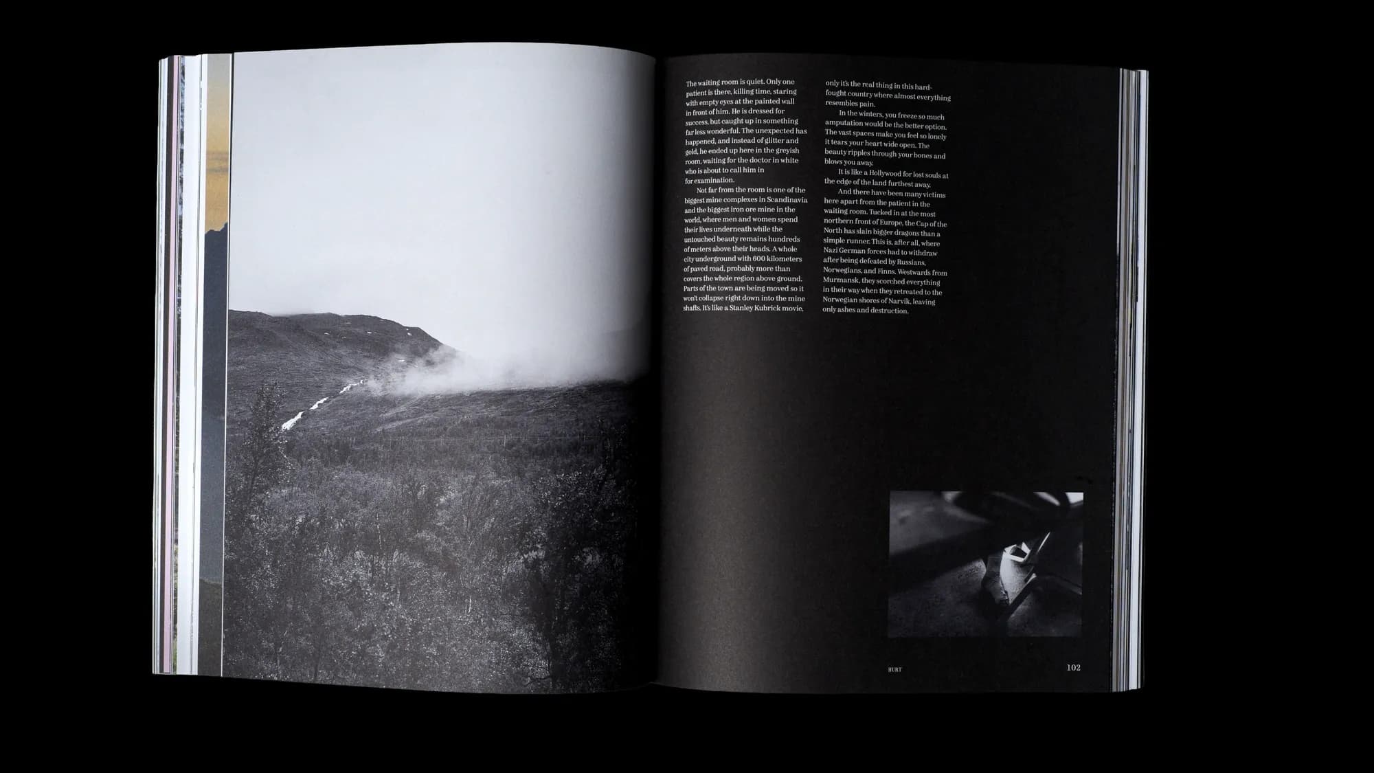 Black-and-white spread from the 'Hurt' story: misty Norwegian iron-ore mining landscape with fog rolling over a ridge, paired with reflective text about Narvik's mines and wartime history.