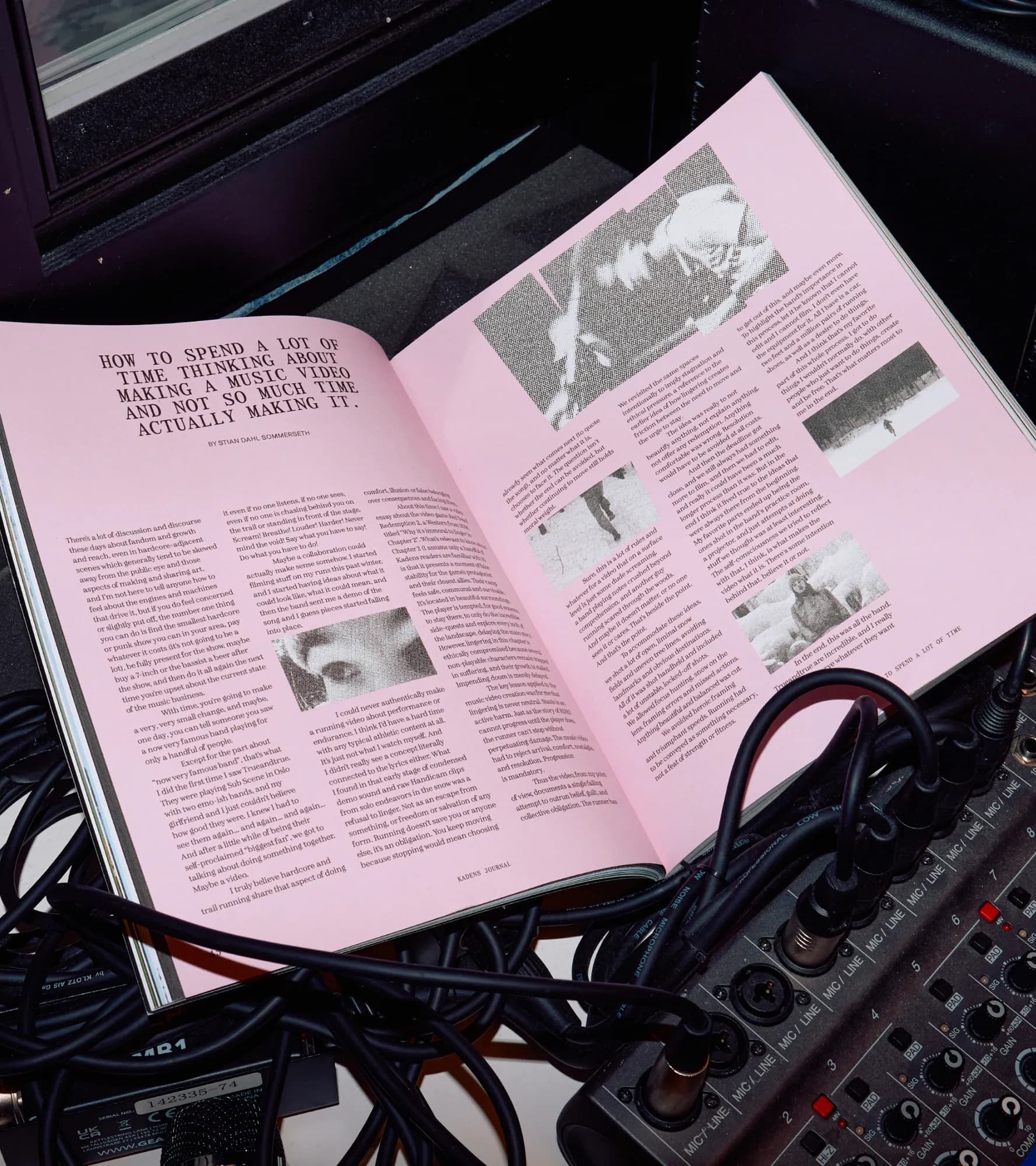 Pink-and-black spread 'How to Spend a Lot of Time Thinking About Making a Music Video' by Stian Dahl Sommerseth, resting on a studio mixing desk with cables and grainy band photos.