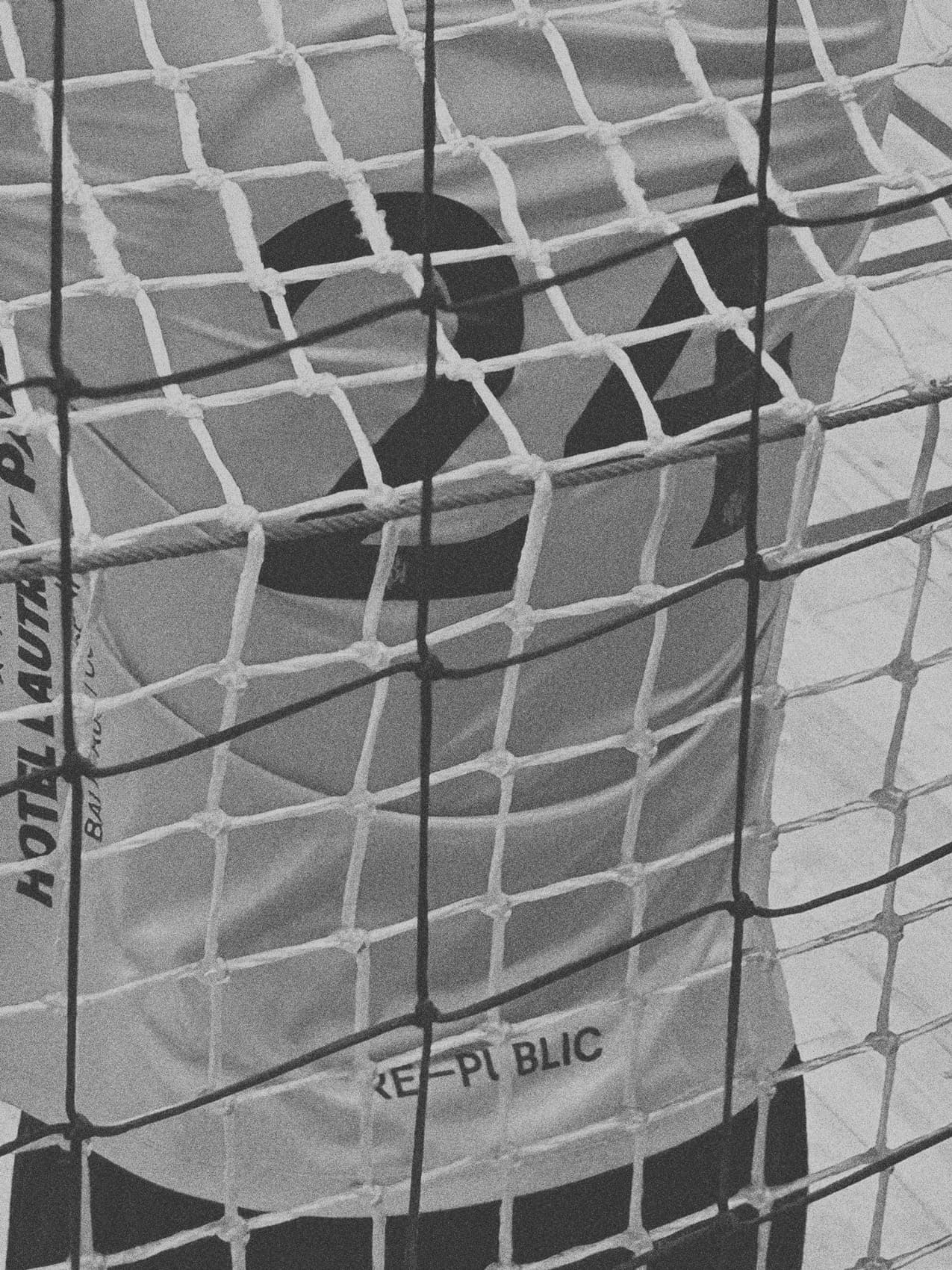 Number 24 written on the back of handball keeper