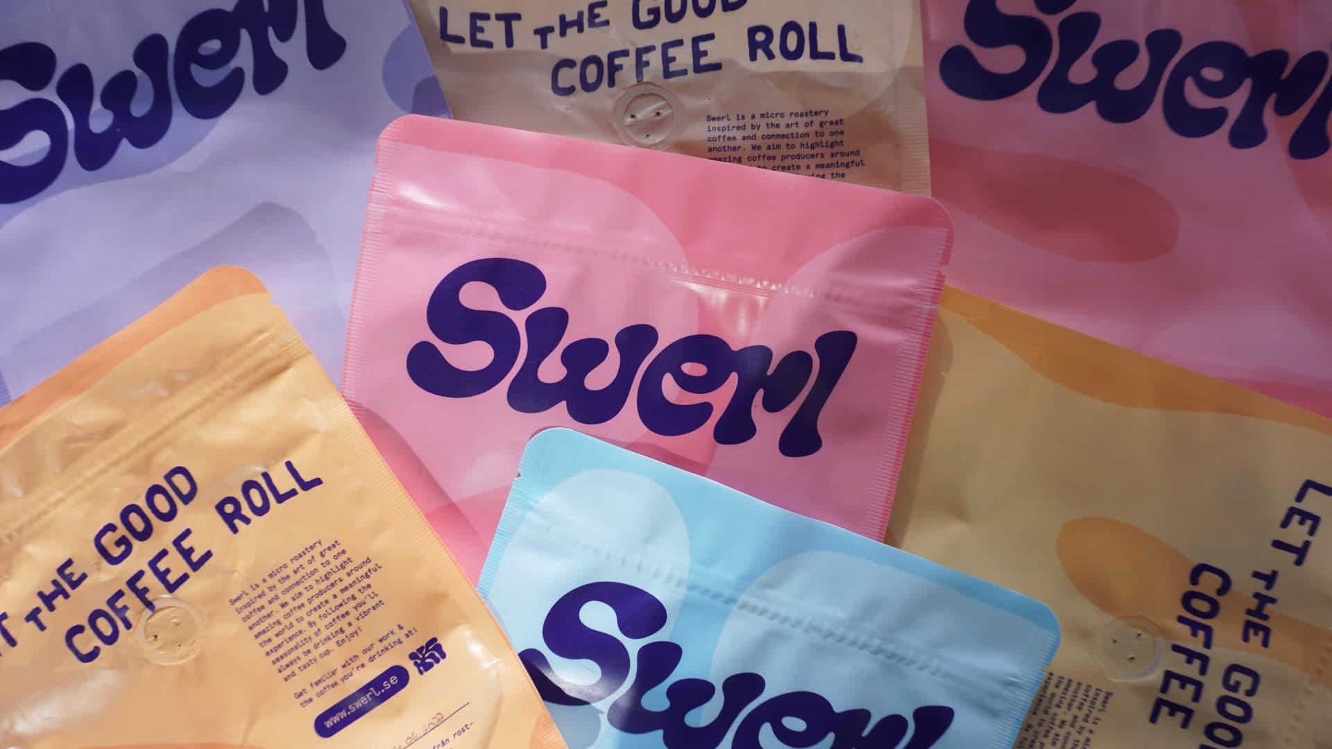 Packs of coffee from Swerl laying on top of each other